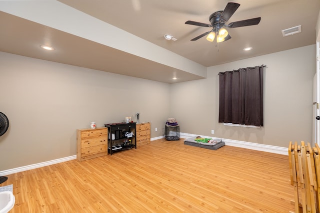 miscellaneous room featuring light hardwood / wood-style floors and ceiling fan