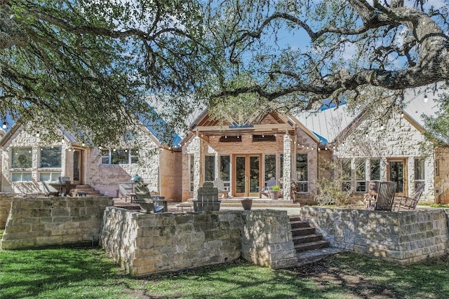 222 Winn Valley Dr, Wimberley, TX 78676 - back of property with french doors