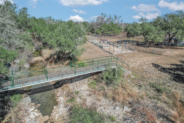 birds eye view of property with a rural view