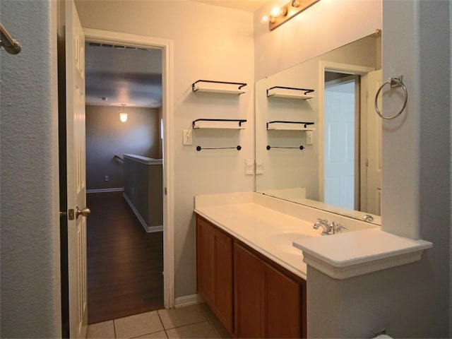 bathroom featuring tile patterned floors and vanity