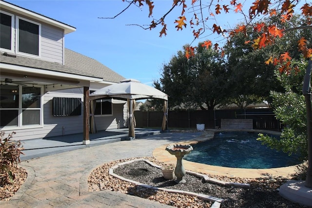 view of pool featuring a gazebo and a patio area