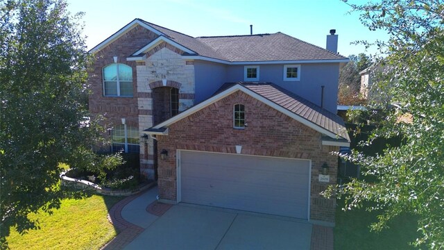 front of property featuring a garage