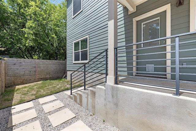 property entrance with fence