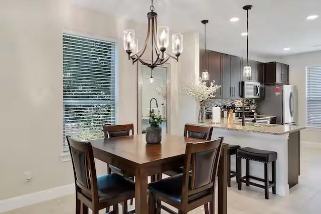 dining area with a chandelier