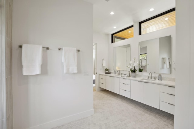 bathroom with vanity and tile patterned flooring