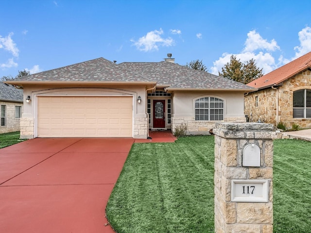 single story home featuring a front yard and a garage