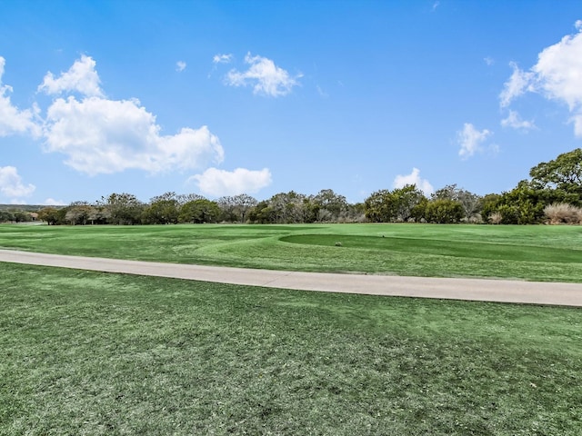 view of home's community featuring a lawn