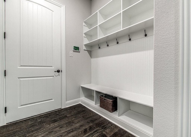 mudroom with dark hardwood / wood-style flooring