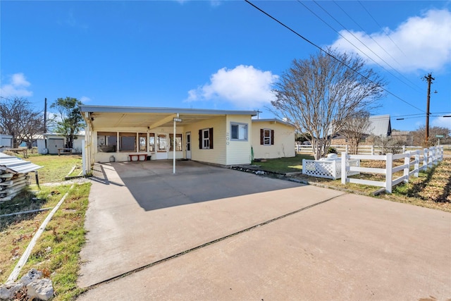 exterior space featuring a carport