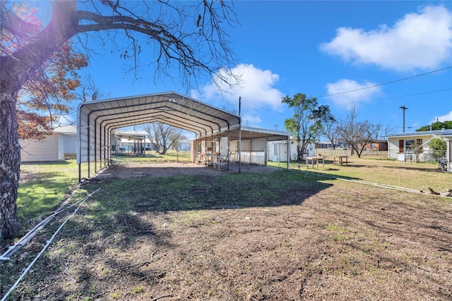 view of yard featuring a carport