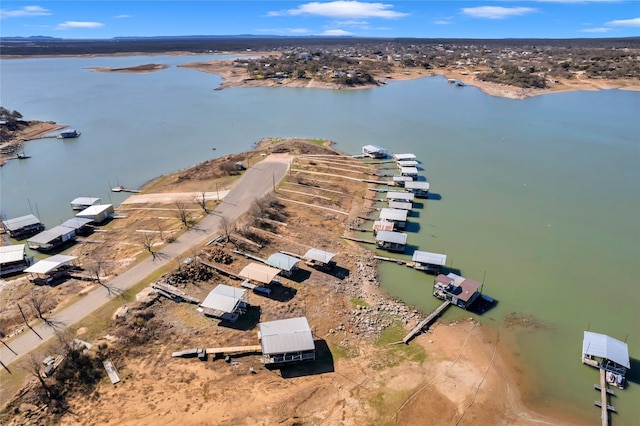 drone / aerial view featuring a water view