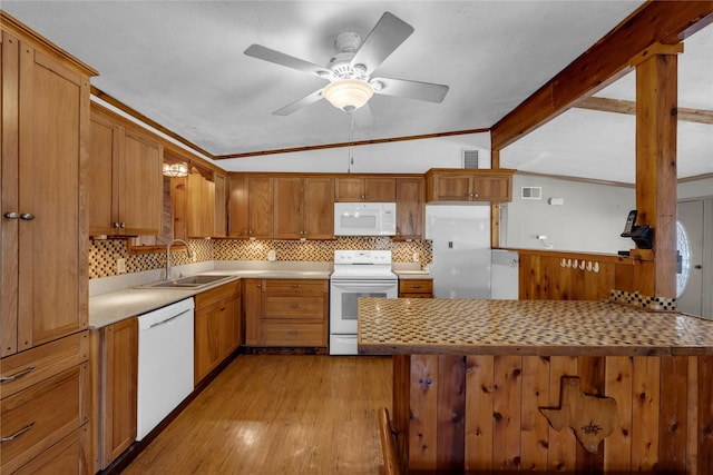 kitchen with ceiling fan, sink, lofted ceiling, white appliances, and light wood-type flooring