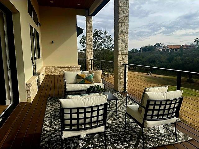 balcony featuring an outdoor living space