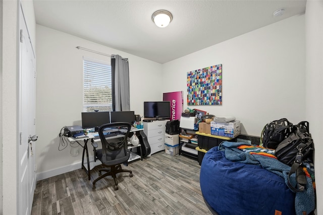 home office featuring hardwood / wood-style floors