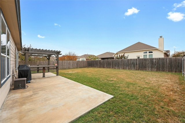 view of yard with a pergola and a patio