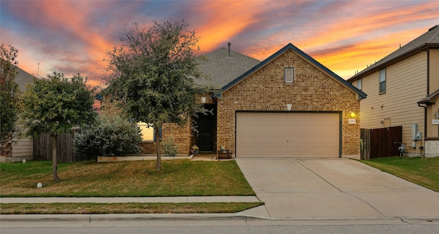 view of front of house with a yard