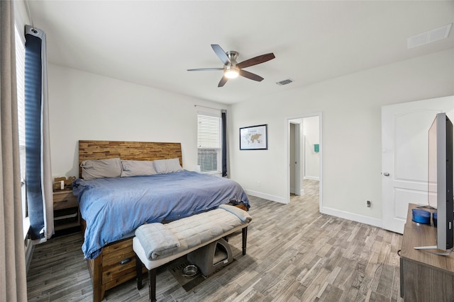 bedroom featuring ceiling fan and wood-type flooring