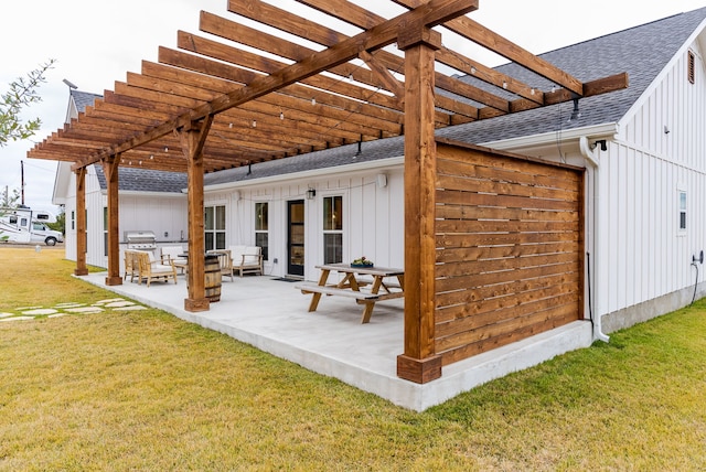 view of patio featuring a pergola and grilling area