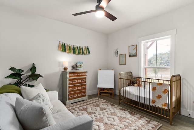 bedroom with ceiling fan and light wood-type flooring