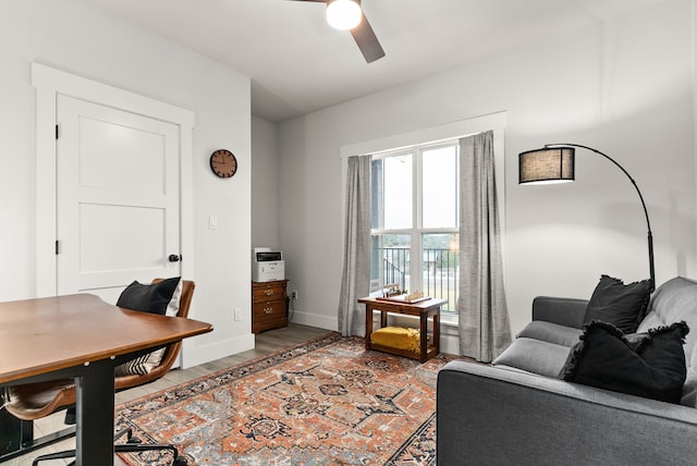 office space featuring hardwood / wood-style flooring and ceiling fan