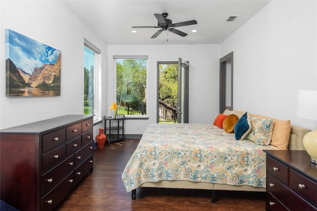 bedroom with access to exterior, dark hardwood / wood-style flooring, and ceiling fan