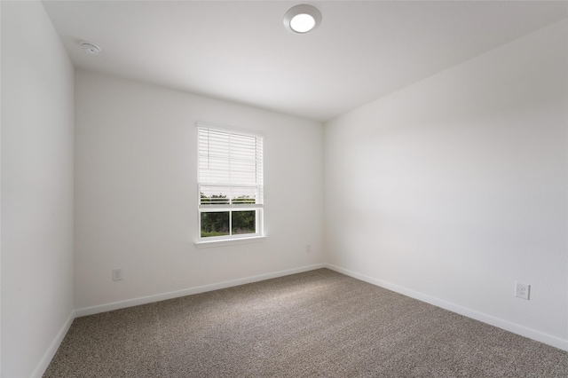 unfurnished room with carpet