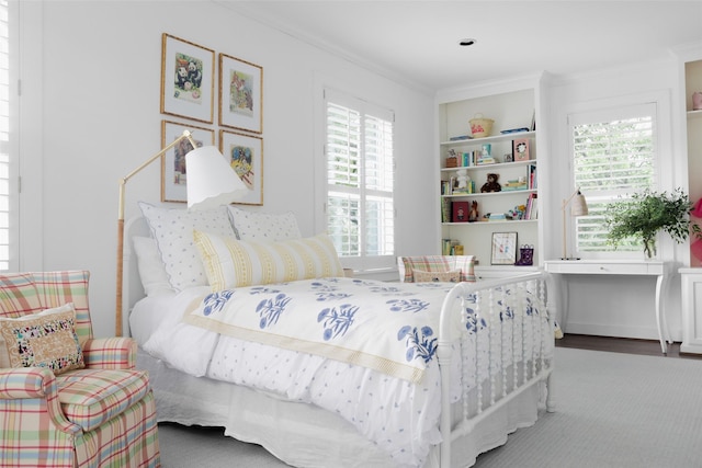 bedroom with crown molding