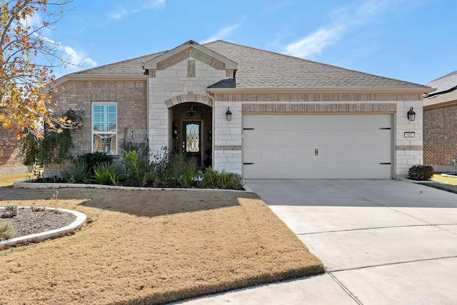 view of front of property featuring a garage