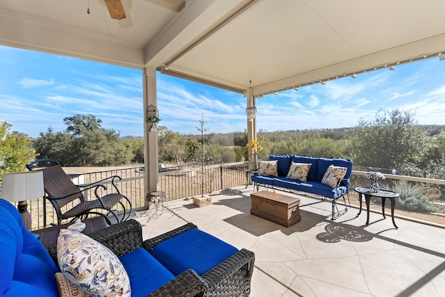 view of patio / terrace with ceiling fan and an outdoor hangout area