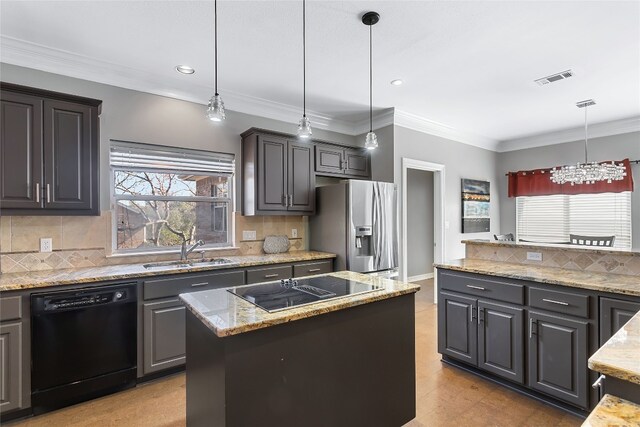 kitchen with black appliances, hanging light fixtures, a center island, crown molding, and sink