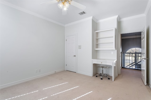 unfurnished bedroom featuring light colored carpet, a ceiling fan, baseboards, visible vents, and crown molding