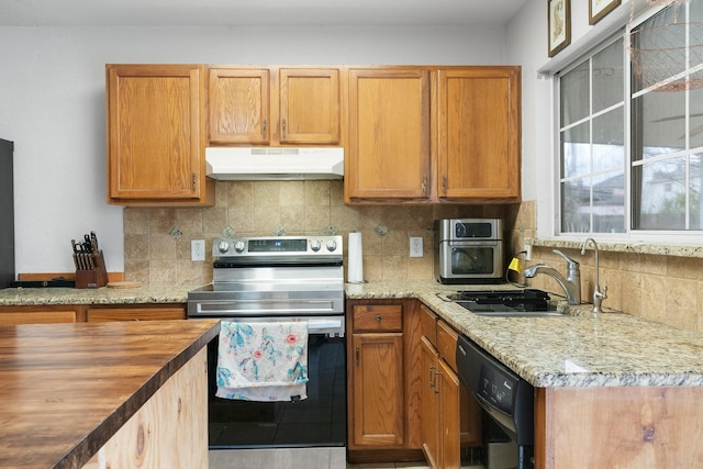 kitchen with tasteful backsplash, wooden counters, stainless steel electric range oven, black dishwasher, and sink