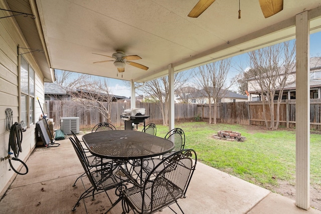 view of patio / terrace with a fire pit, ceiling fan, central AC unit, and area for grilling