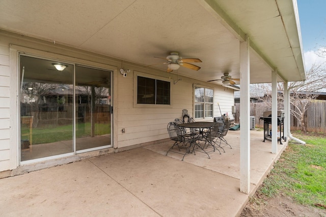 view of patio with ceiling fan and area for grilling