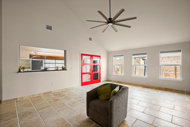 sitting room featuring high vaulted ceiling and ceiling fan