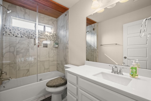 full bathroom with toilet, shower / bath combination with glass door, and vanity