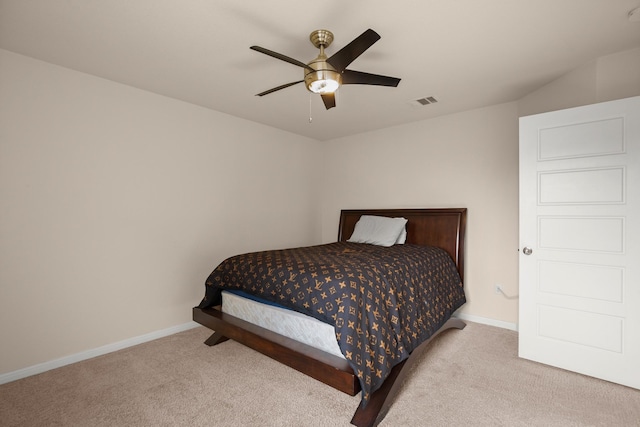 bedroom featuring ceiling fan and light carpet