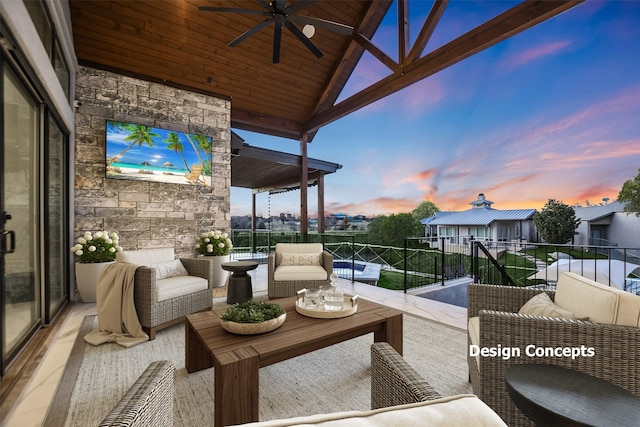 view of patio with a balcony, ceiling fan, and an outdoor living space