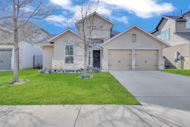 view of front of house with a garage and a front yard