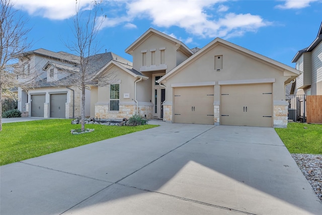 view of front facade featuring a front lawn and a garage