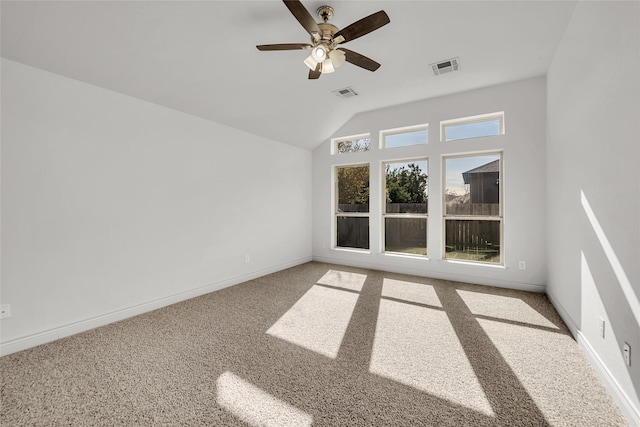 empty room with ceiling fan and carpet