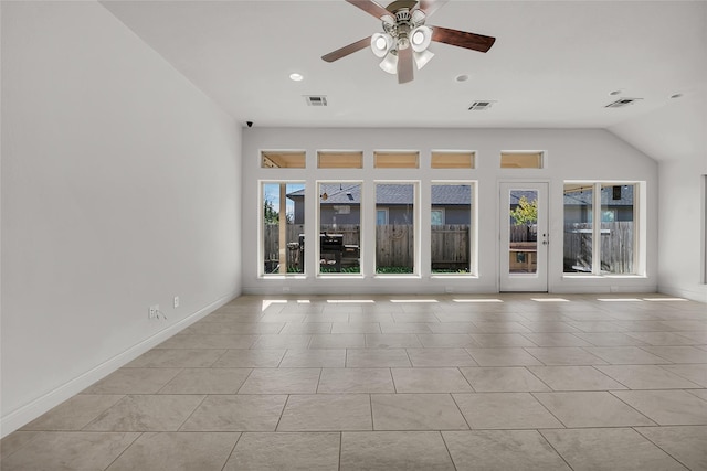 tiled spare room with ceiling fan