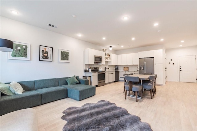 living room featuring light wood-type flooring