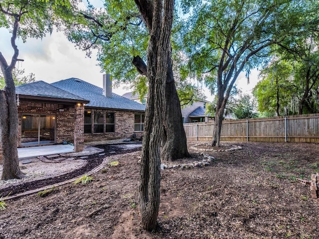 737 Foxtail Run, San Marcos, TX 78666 - view of yard with fence and a patio area