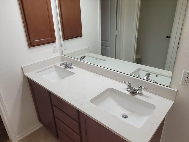 737 Foxtail Run, San Marcos, TX 78666 - full bathroom featuring double vanity and toilet