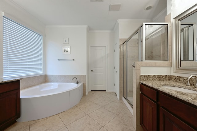 bathroom featuring crown molding, plus walk in shower, tile patterned floors, and vanity