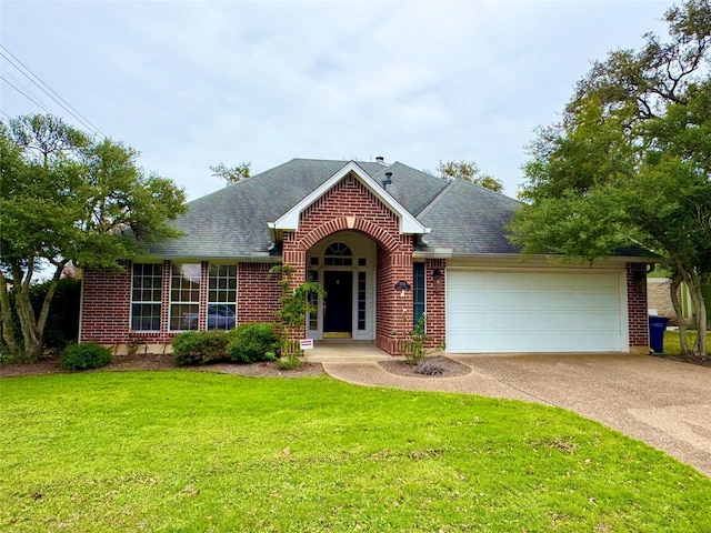 view of front facade featuring a front yard and a garage