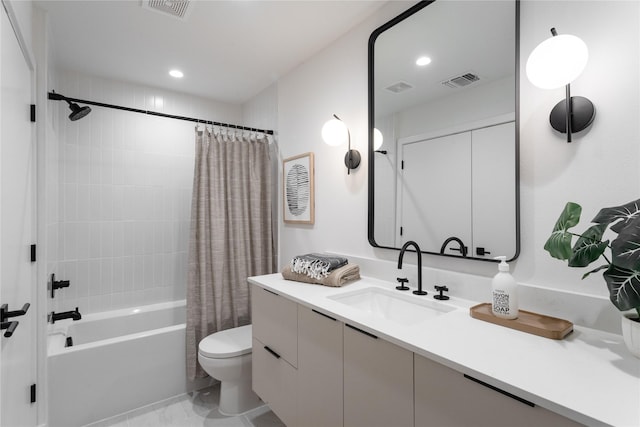 full bathroom with toilet, tile patterned flooring, vanity, and shower / bath combo