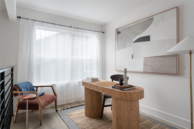 office area with hardwood / wood-style flooring