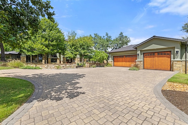 view of front of property with a garage